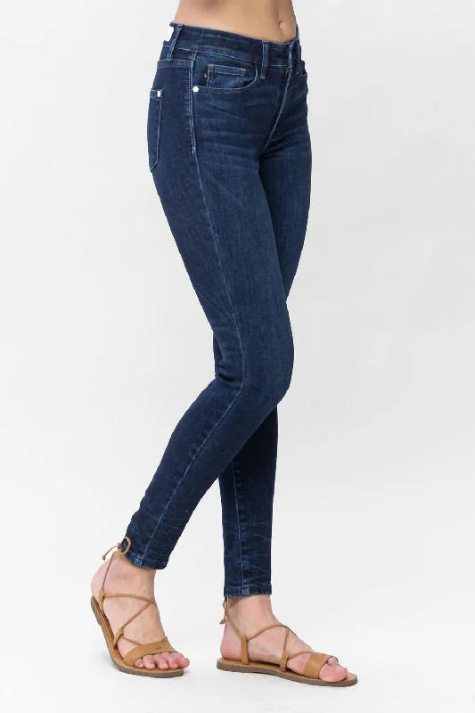 mid-rise-skinny-jeans-in-dark-blue