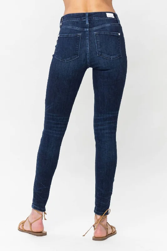 mid-rise-skinny-jeans-in-dark-blue